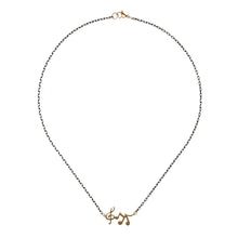 Load image into Gallery viewer, black-gold-chain-music-pendant-necklace-heartbeat-london.jpg