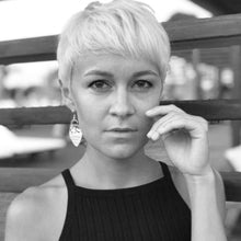 Load image into Gallery viewer, ulyana-guda-wearing-silver-pick-earrings-by-heartbeat-jewellery-london.jpg