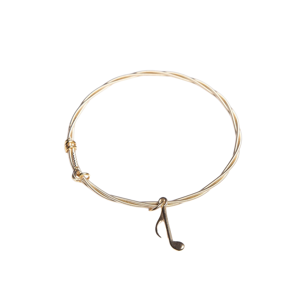 gold-music-note-pendant-guitar-string-bracelet.png