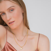 Load image into Gallery viewer, gold on the ceiling gold necklace on a model
