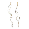 long-wire-gold-earrings-with-music-key-pendant.jpg