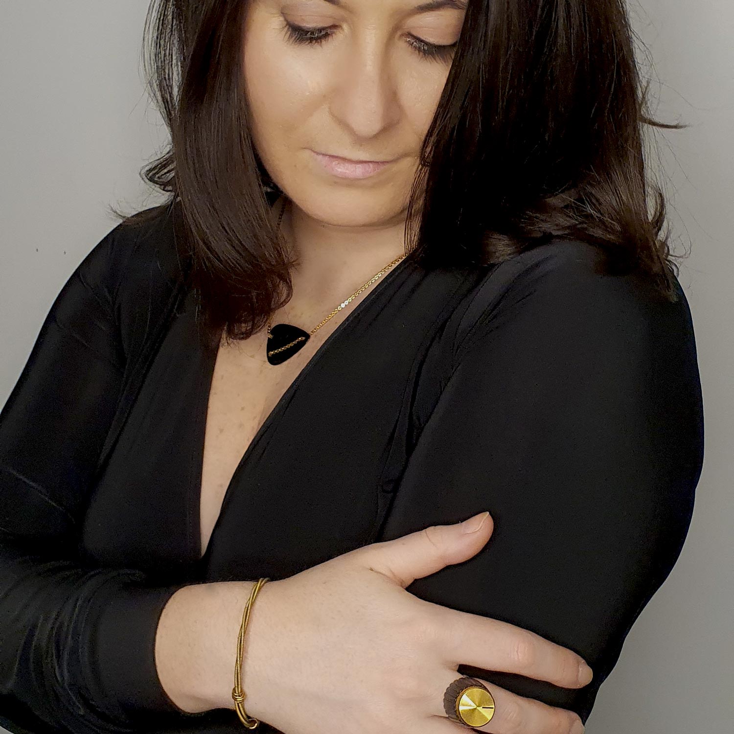 model-wearing-black-guitar-pick-necklace-heartbeat-london-rock-collection.jpg