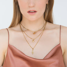 Load image into Gallery viewer, multiple-layer-gold-music-necklace-on-a-light-skin-model
